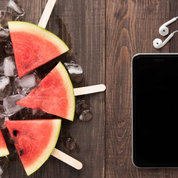 Fruit,Ice,Cream,Wiith,Smartphone,On,Wooden,Background.